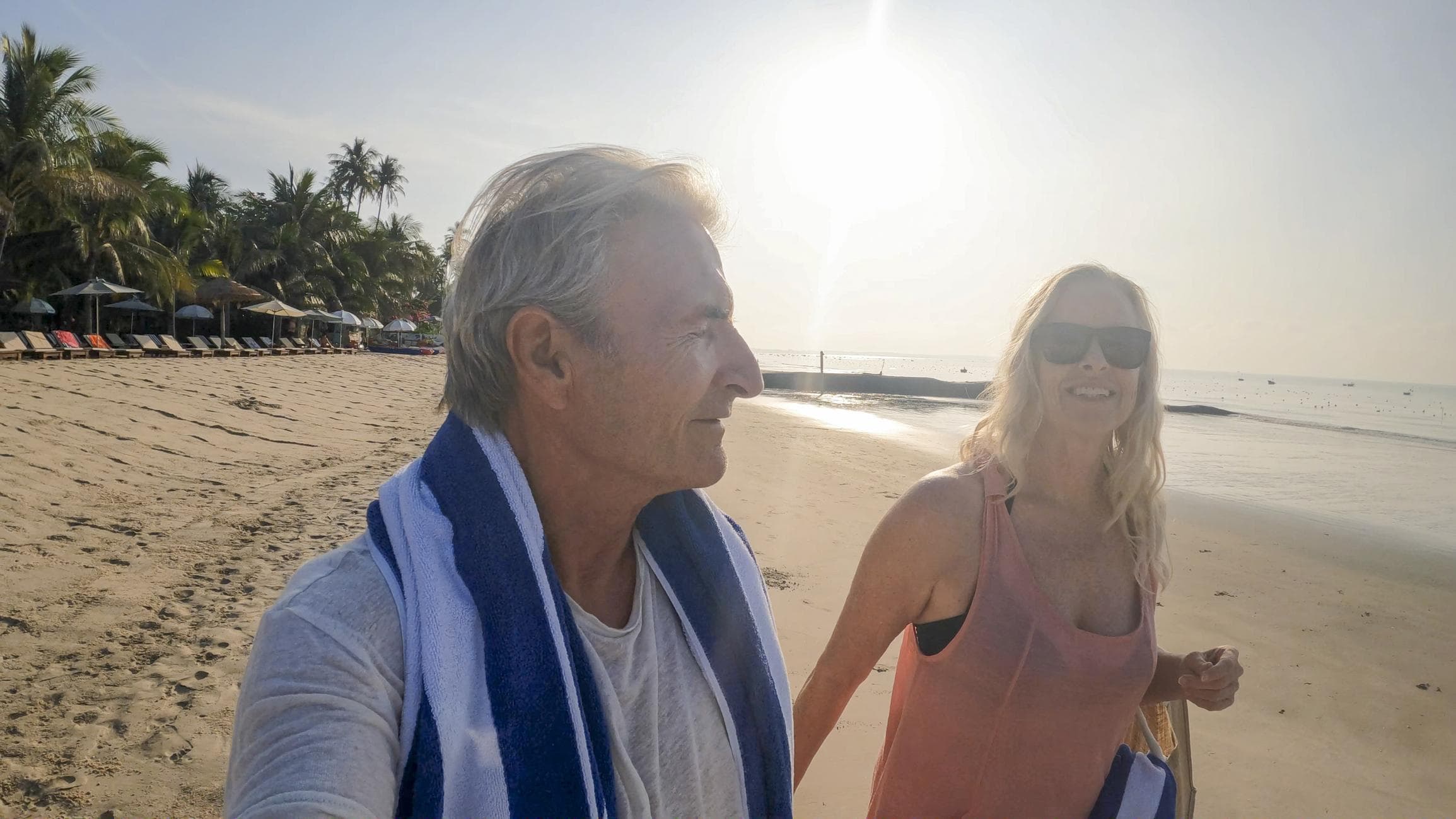 A couple relaxing on a quiet beach in Vietnam